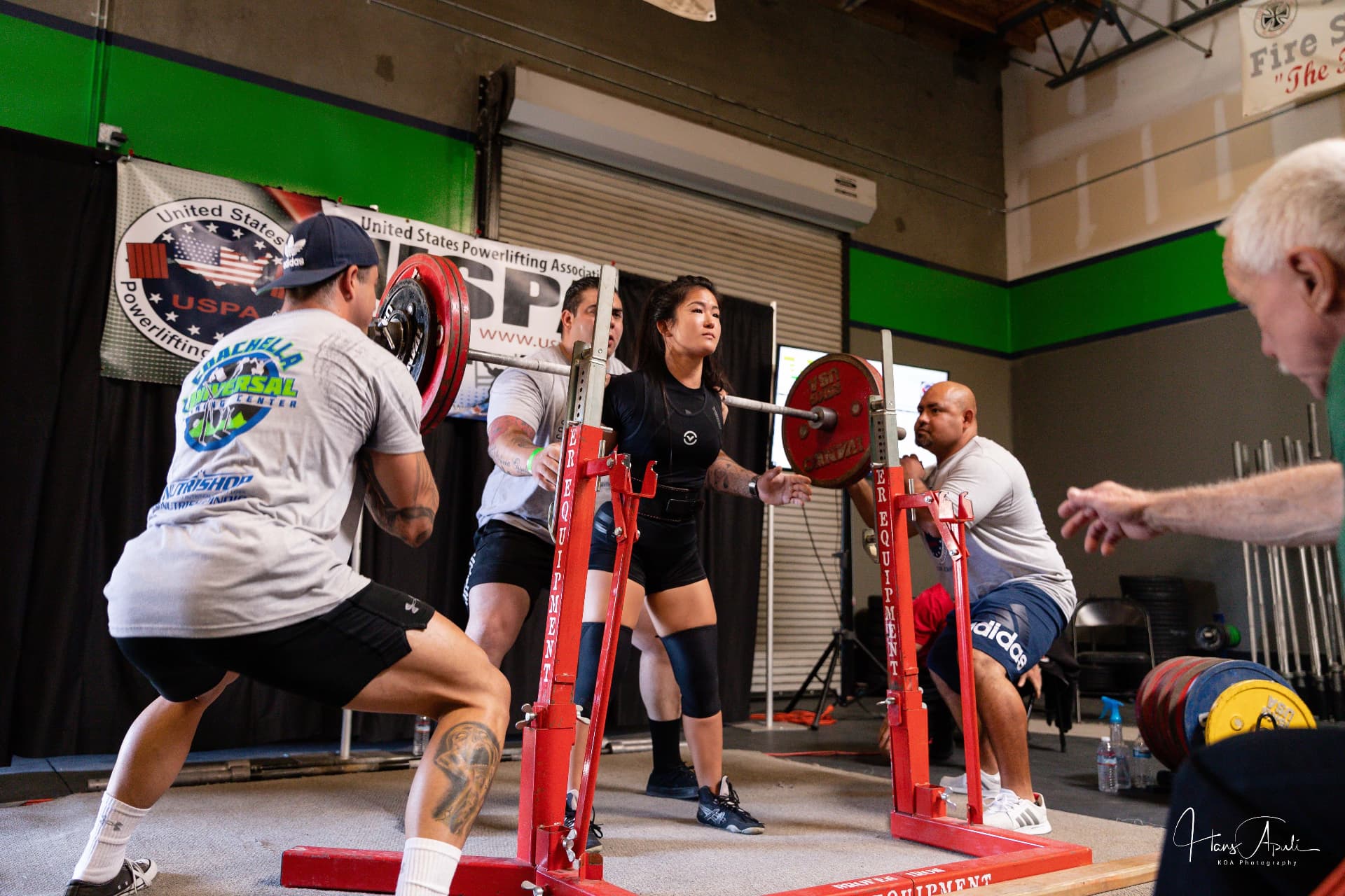 Jessica competing in a powerlifting squat meet