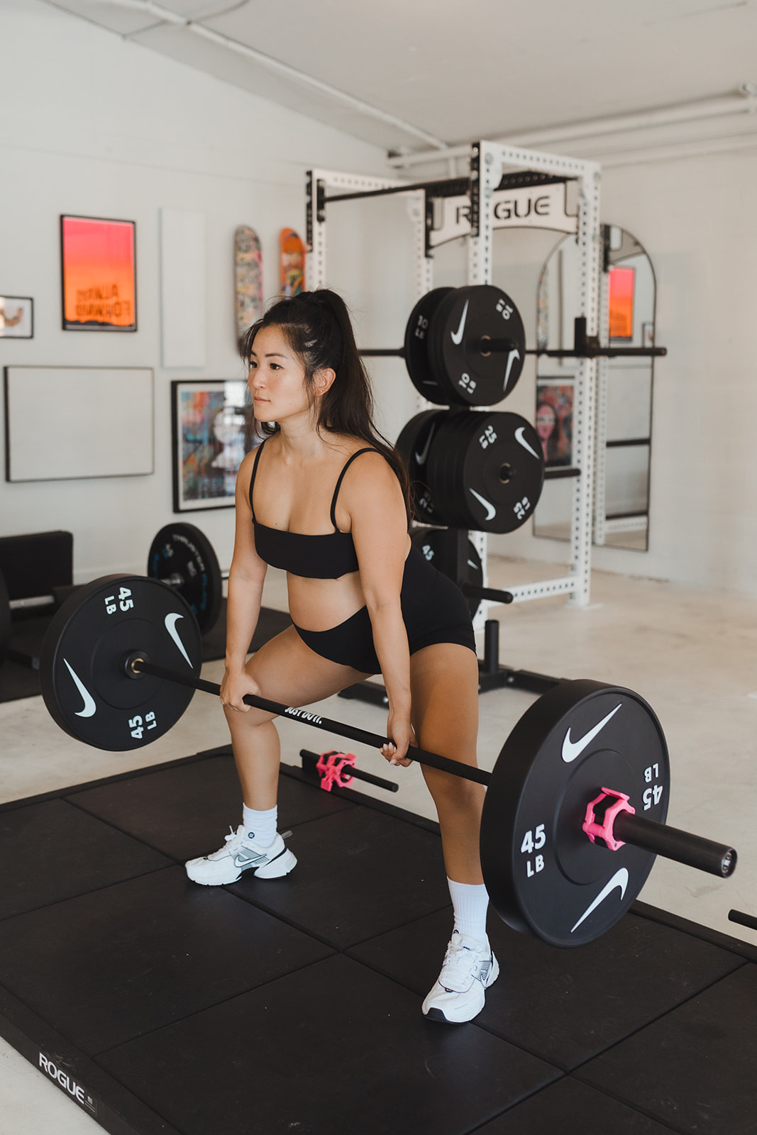 Jessica setting up for a deadlift in the studio