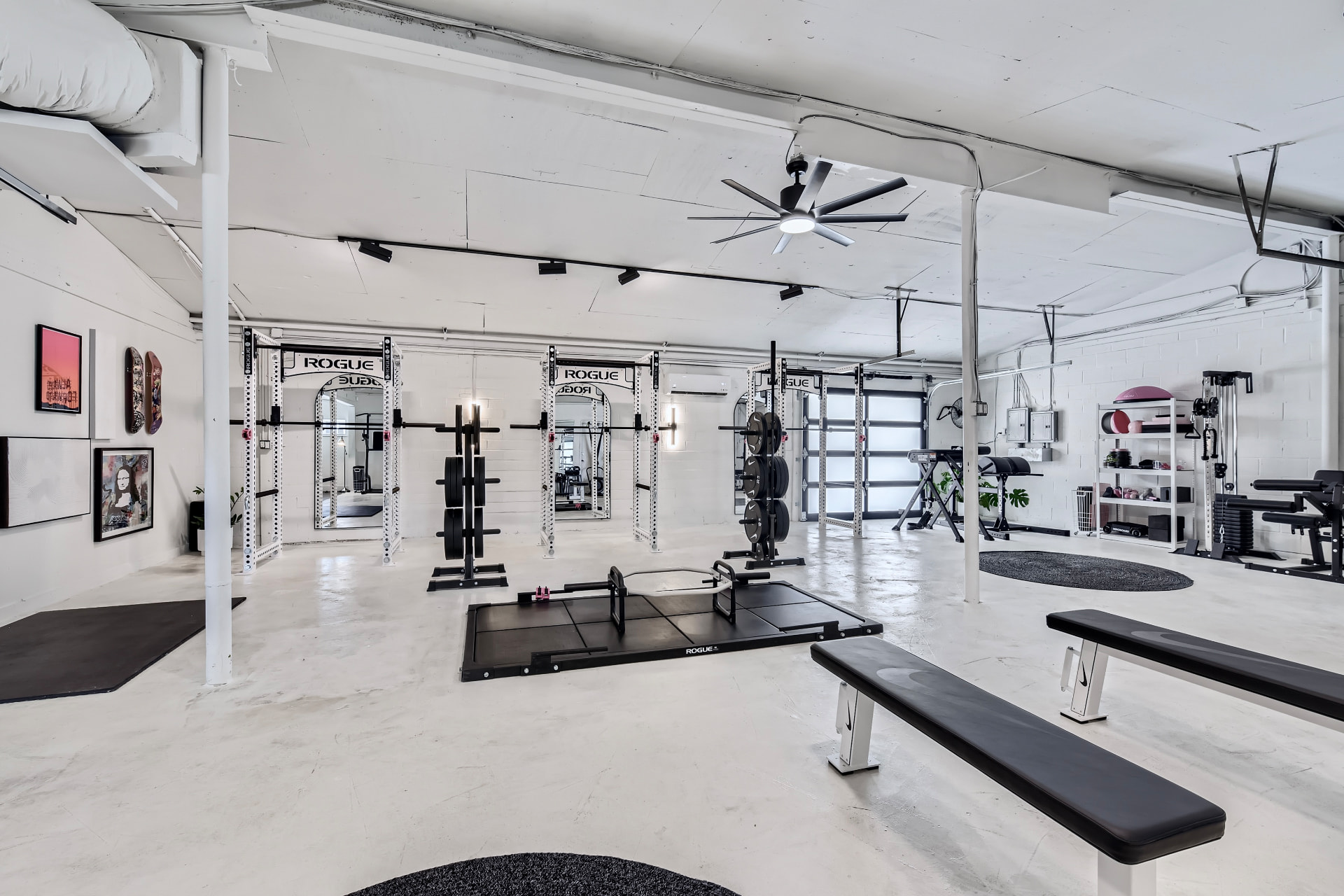 The bright, private training floor at Axiom Fitness Studio
