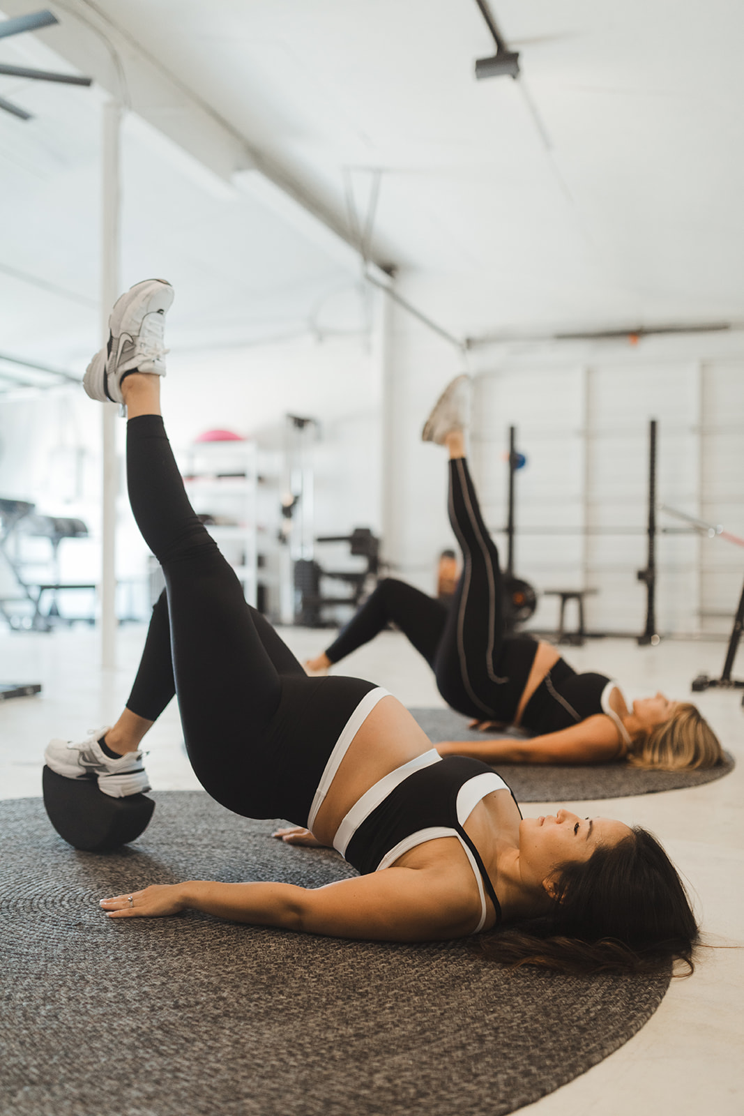 Pregnant client working through a strength session